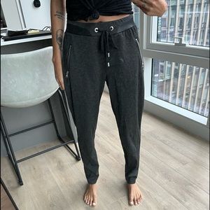 grey and black sweats with pleather pieces